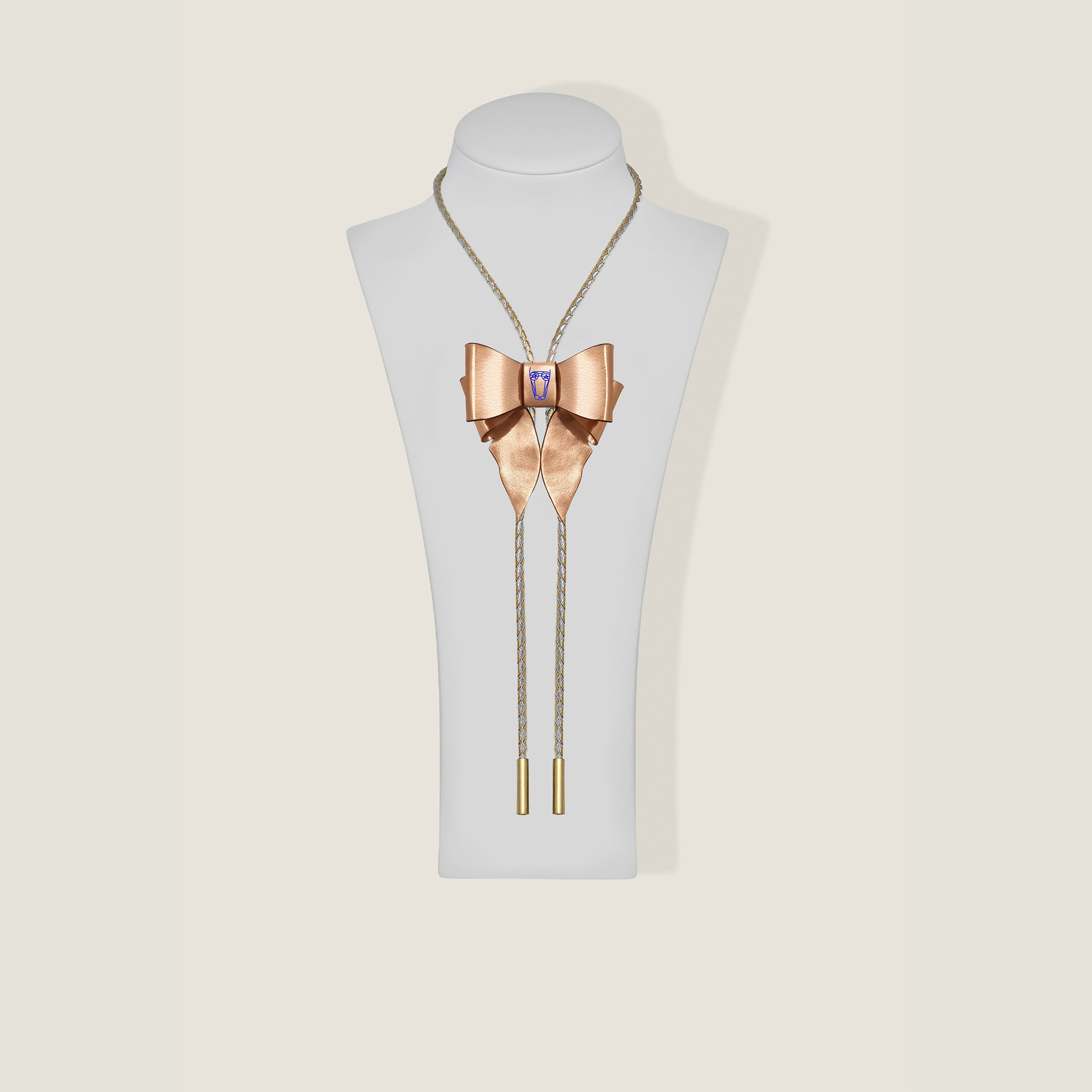 Marrs Makers Rose Gold Leather Bolo Necklace with Bow Ornament Braided Leather Cord Gold-Plated Metal Tips on Mannequin