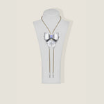 Marrs Makers Metallic Silver Leather Bolo Necklace Shown on Mannequin 