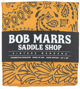 Bob Marrs Poinsettia-Paisley Collectible Bandana - Amarillo Gold shown with Bob's custom hand-rendered typeface label 