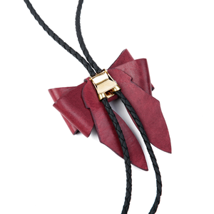 Bolo tie necklace gold-plated metal clip closure